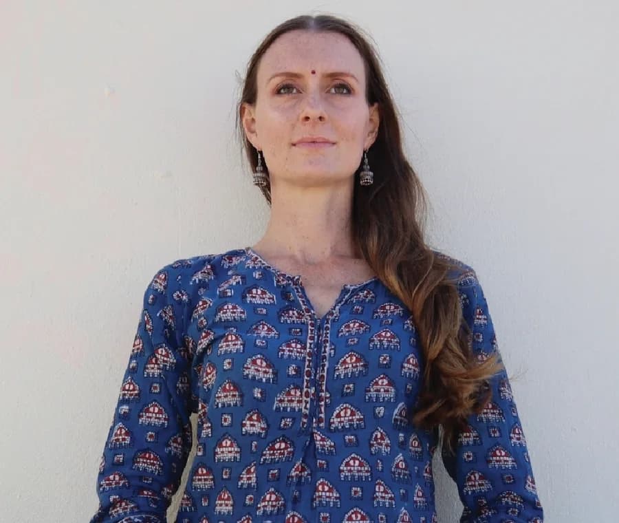 Portrait of Amy Landry, Teacher Training behind The Ocean of Yoga