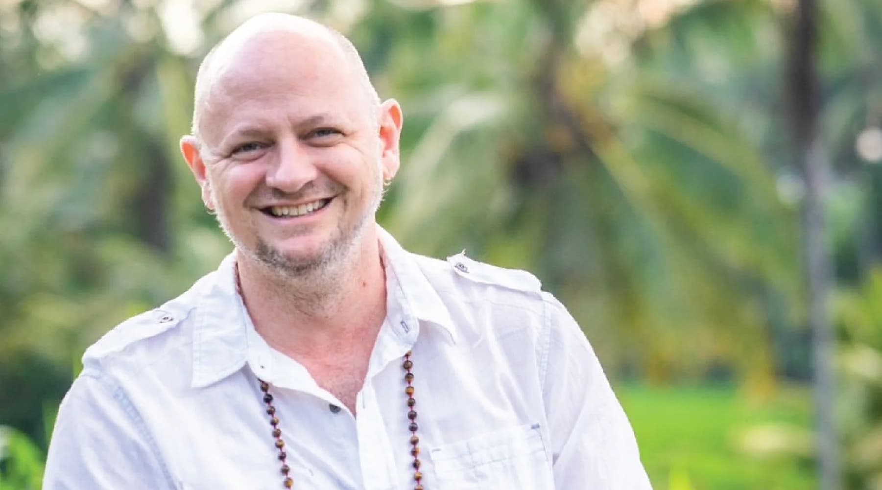 Black-and-white portrait of Tory Schaefer, Community Builder behind Wonderland Yoga