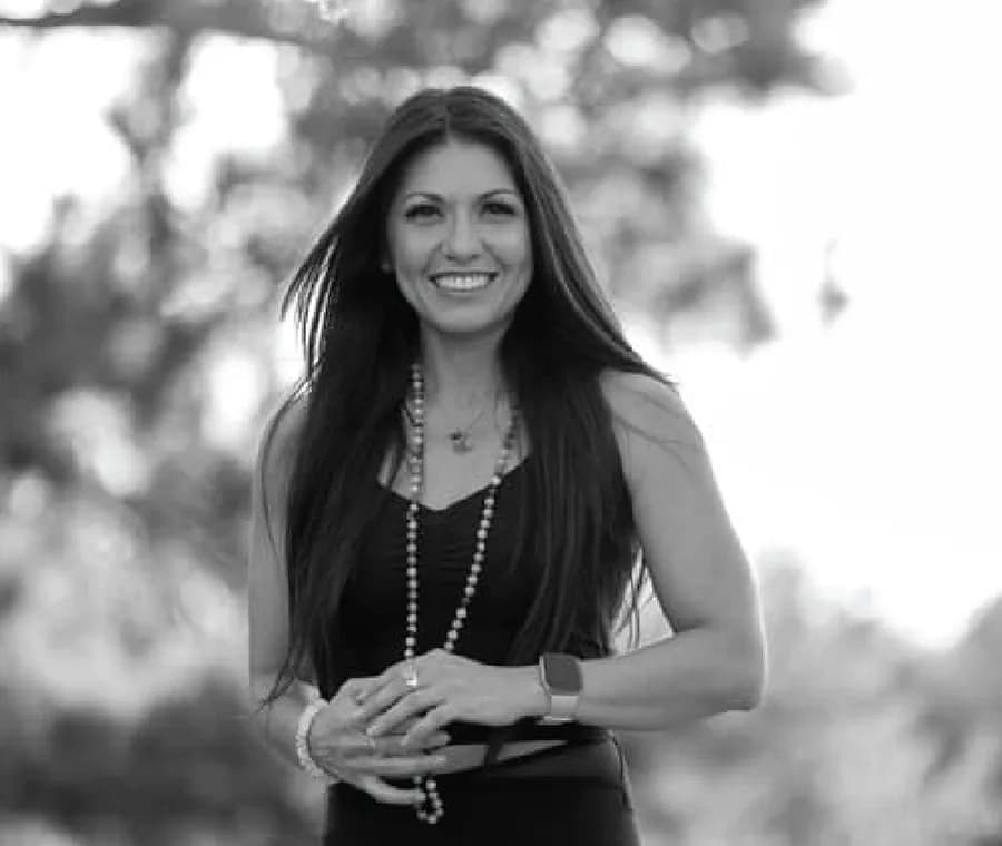 Portrait of Kelly Sabrina Aguilar, Teacher Training behind Kelly Sabrina Aguilar