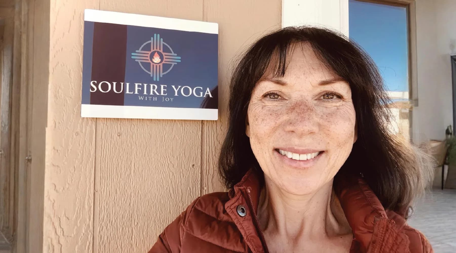 Black-and-white portrait of Joy Nagle, Studio Owner behind Soulfire Yoga with Joy https: