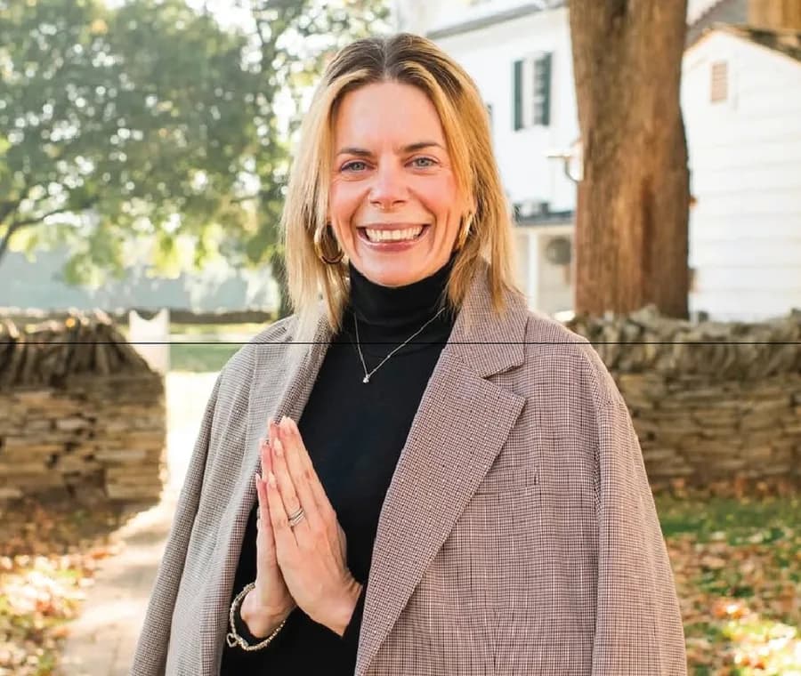 Portrait of Katherine Sheridan, Yoga Teacher behind youtube.com