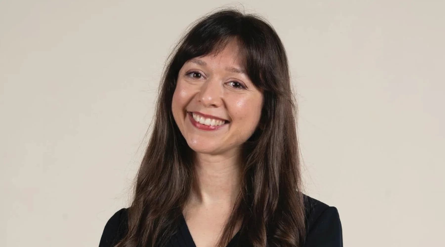 Black-and-white portrait of Sarah Haghighi, Wellness Founder behind Wellness Founder