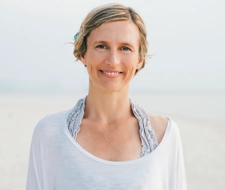 Portrait of Lorraine Taylor, Teacher Training behind lorrainetayloryoga.com