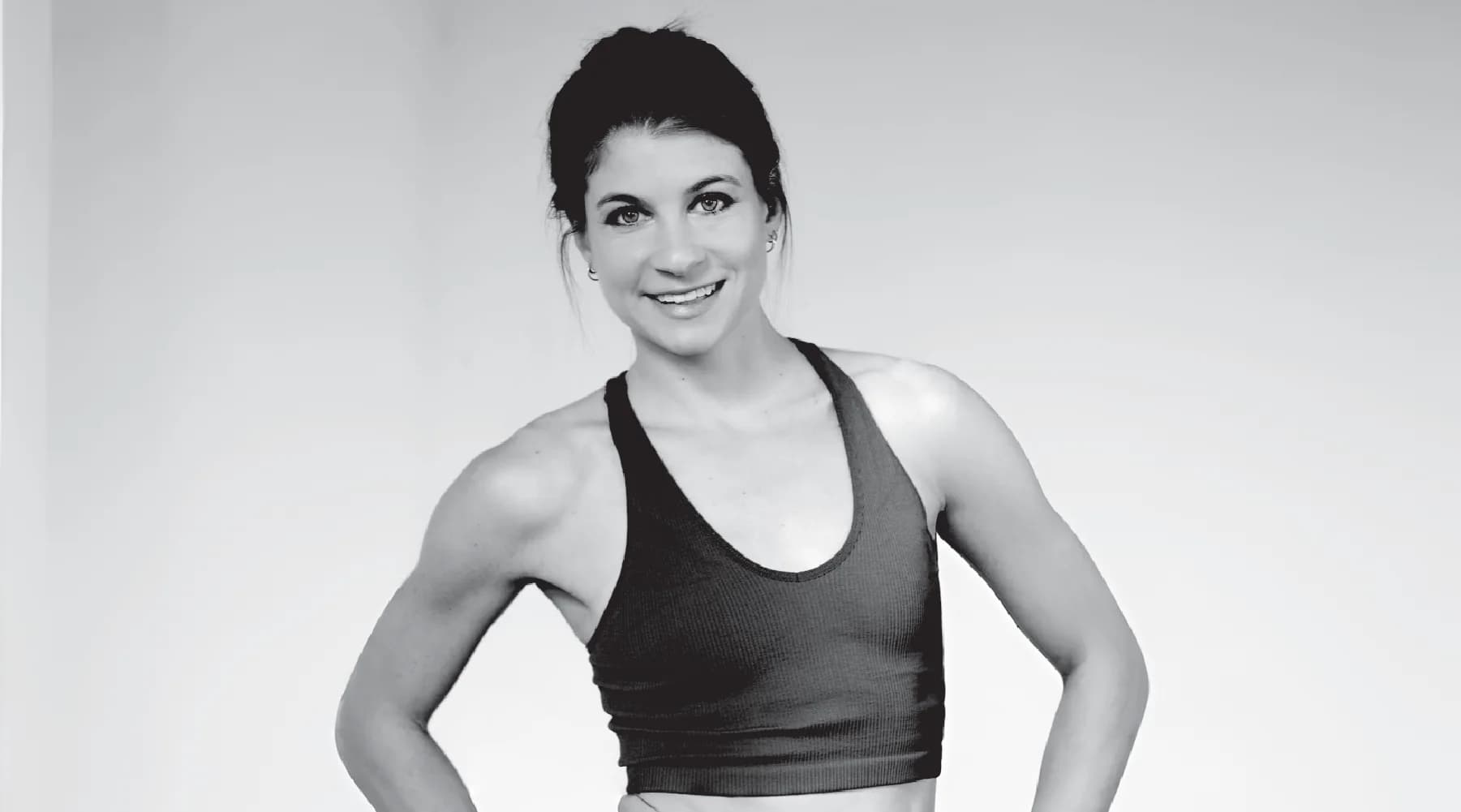 Black-and-white portrait of Adell Bridges, Yoga Teacher behind Move with Adell