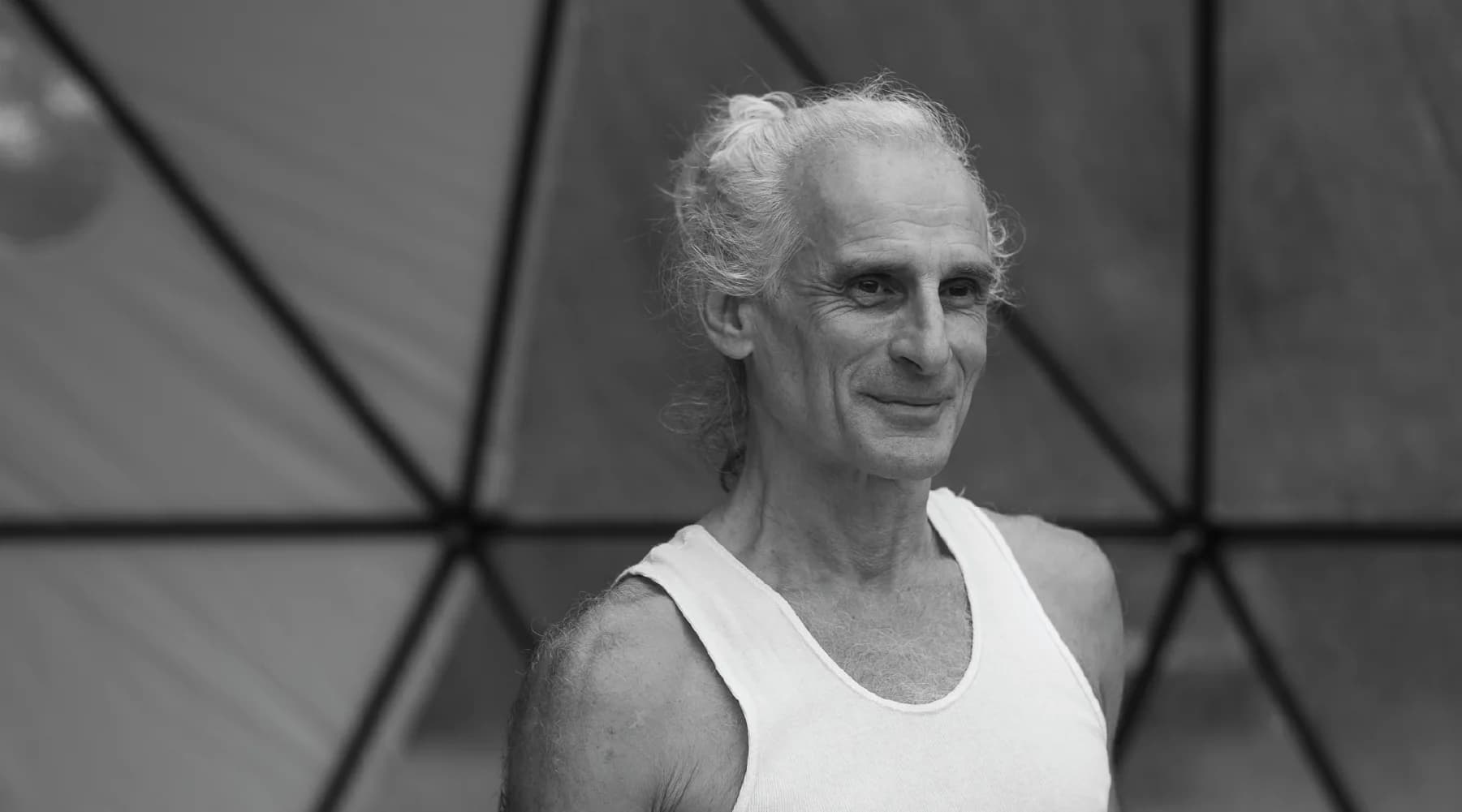Black-and-white portrait of Simon Borg Olivier, Teacher Training behind simonborgolivier.com