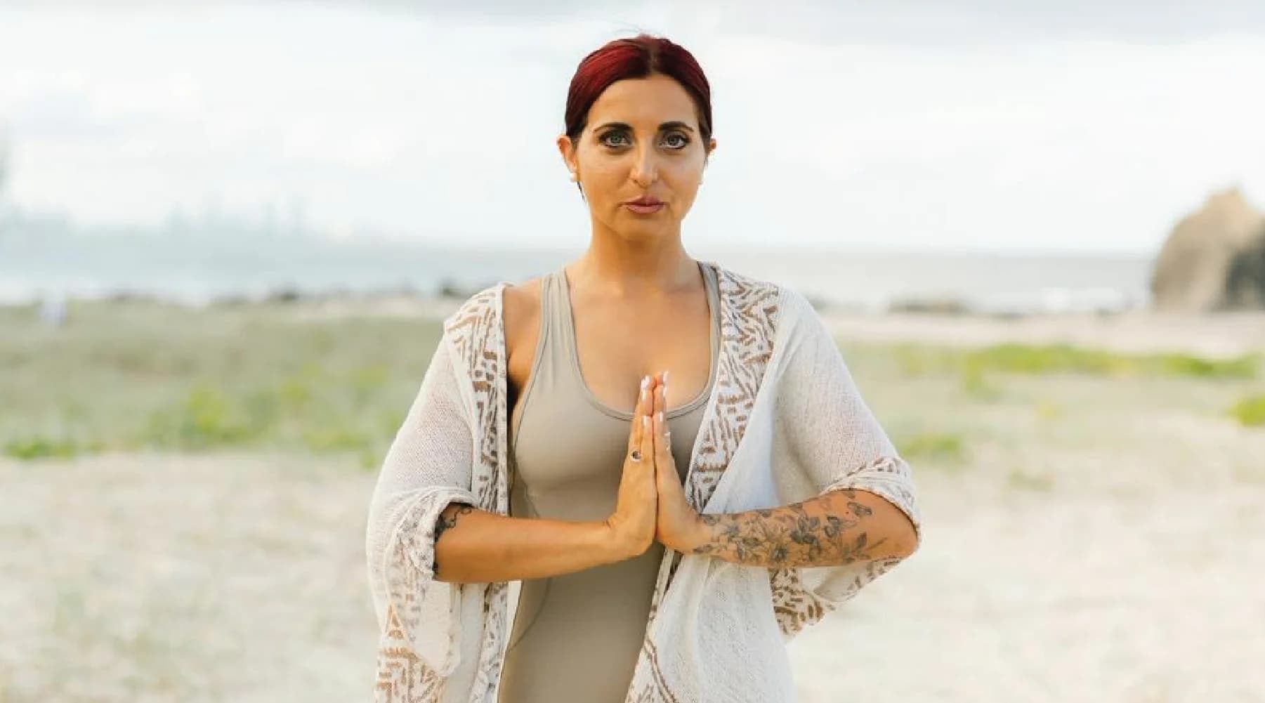 Black-and-white portrait of Monica Arcoya, Yoga Teacher behind monicaarcoya.impact.me