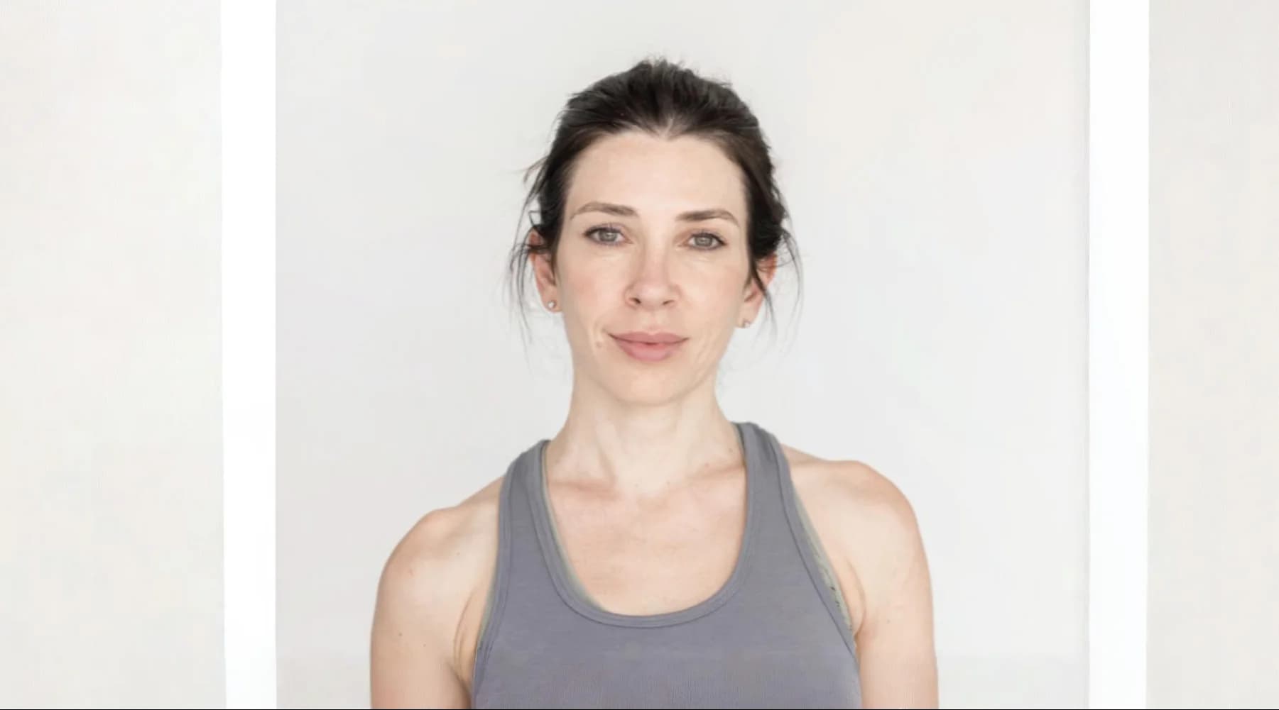 Black-and-white portrait of Helen Calligeris, Yoga Teacher behind intergr8therapy.com