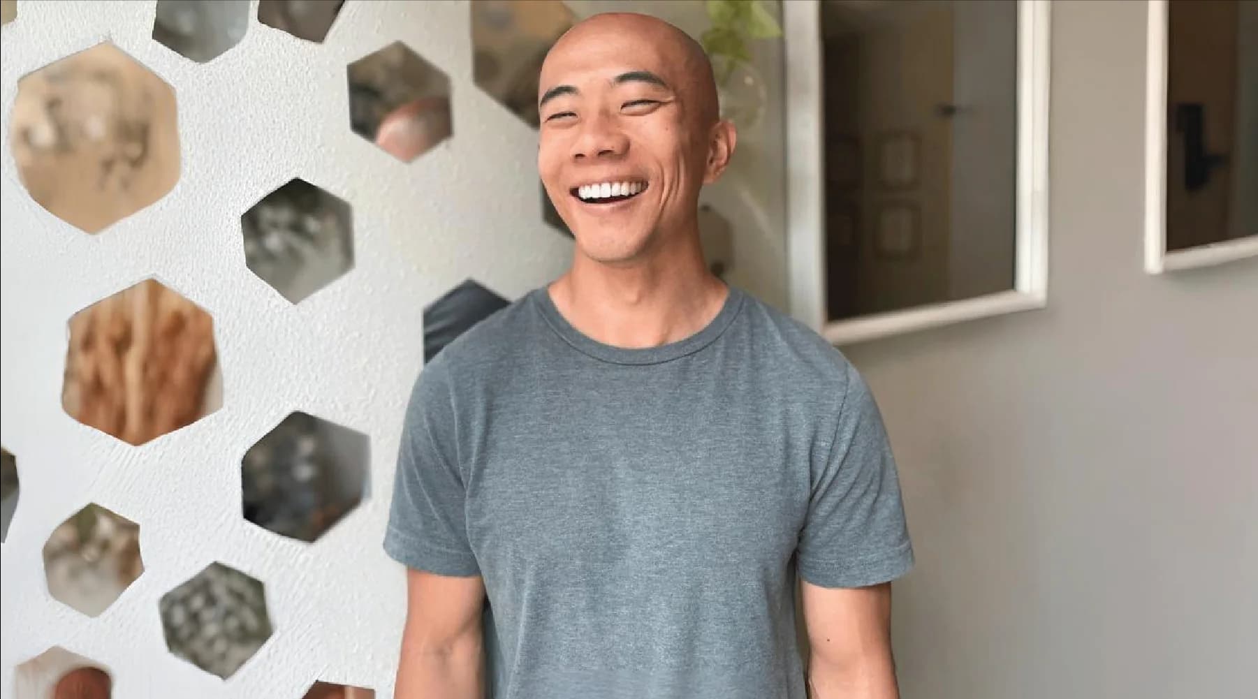 Black-and-white portrait of Peter Lin, Yoga Teacher behind empower-mend.com