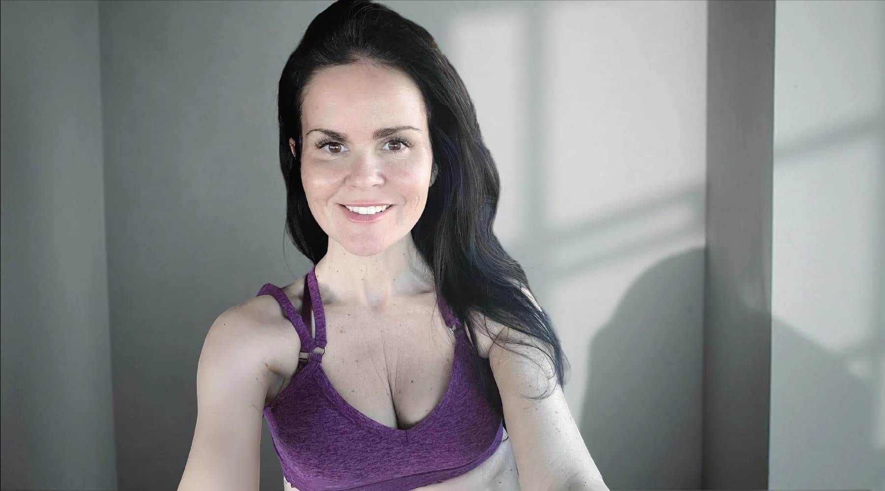 Black-and-white portrait of Cindy Waldman, Yoga Teacher behind houseoflightyoga.net